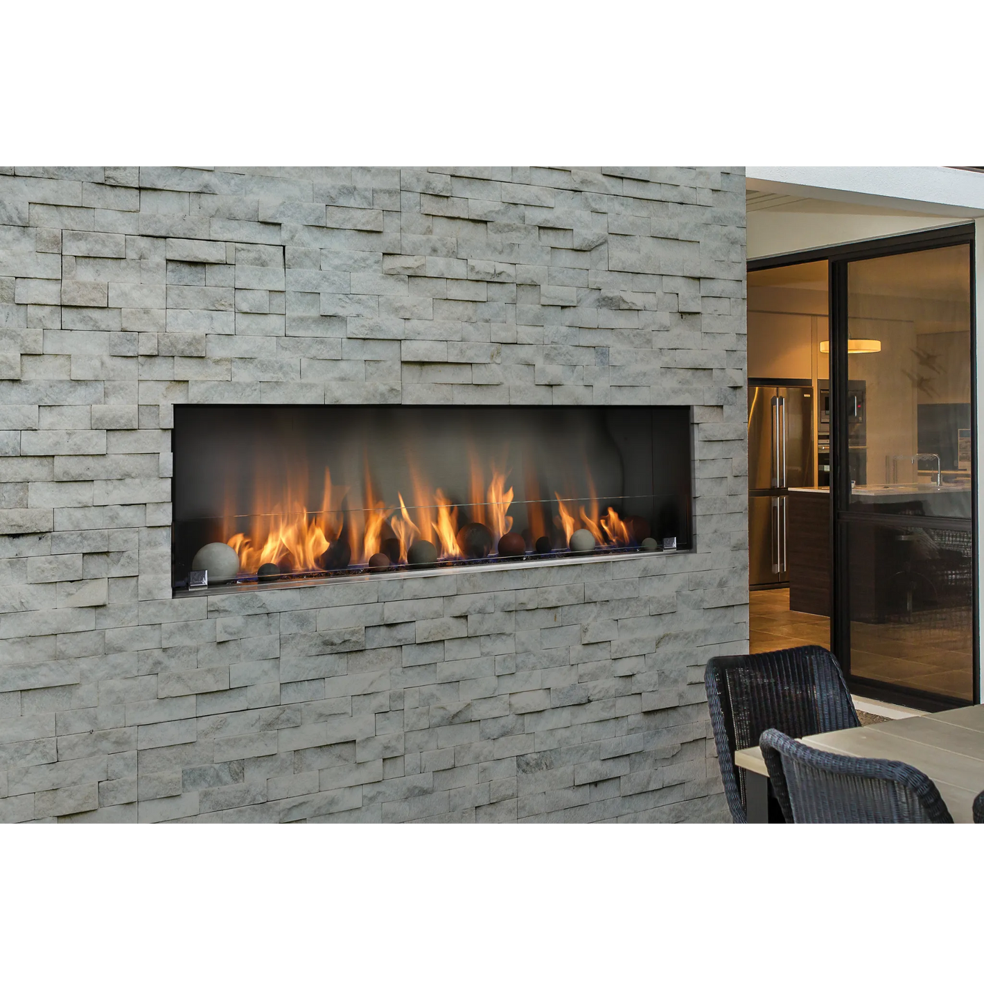 Outdoor see through linear fireplaces